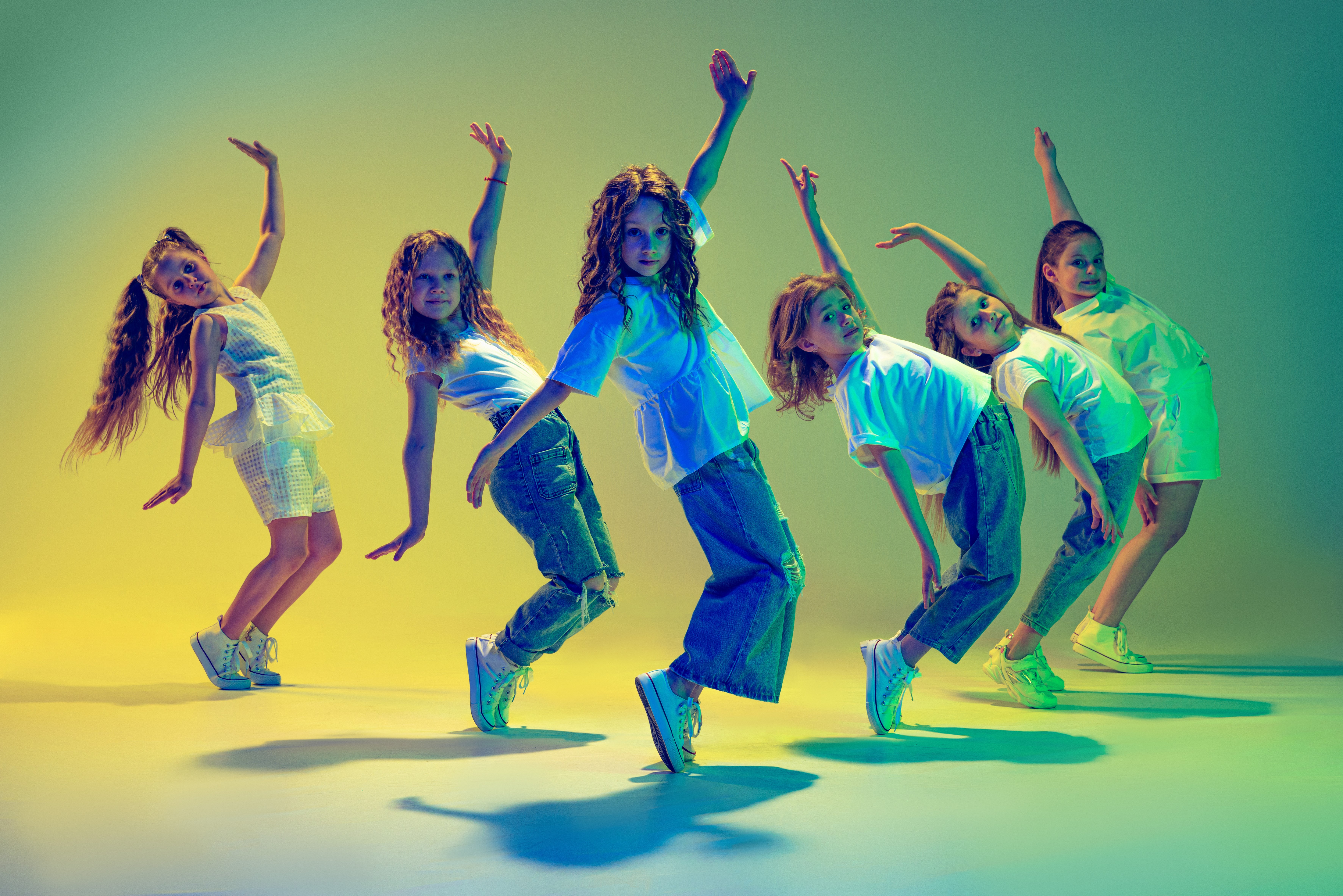 image of hip hop dancers dancing in synch facing the camera