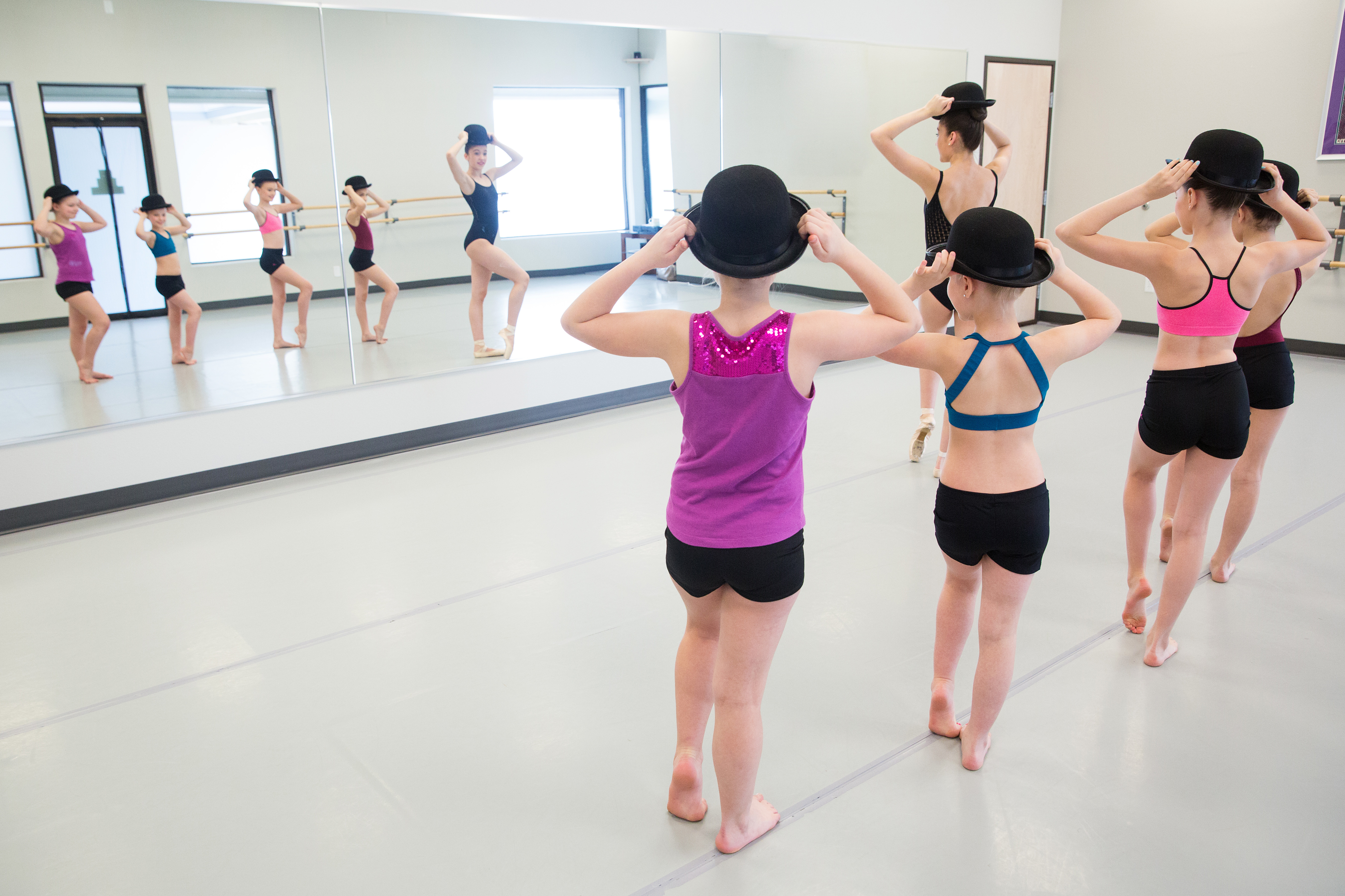 instructor and dancers in jazz class