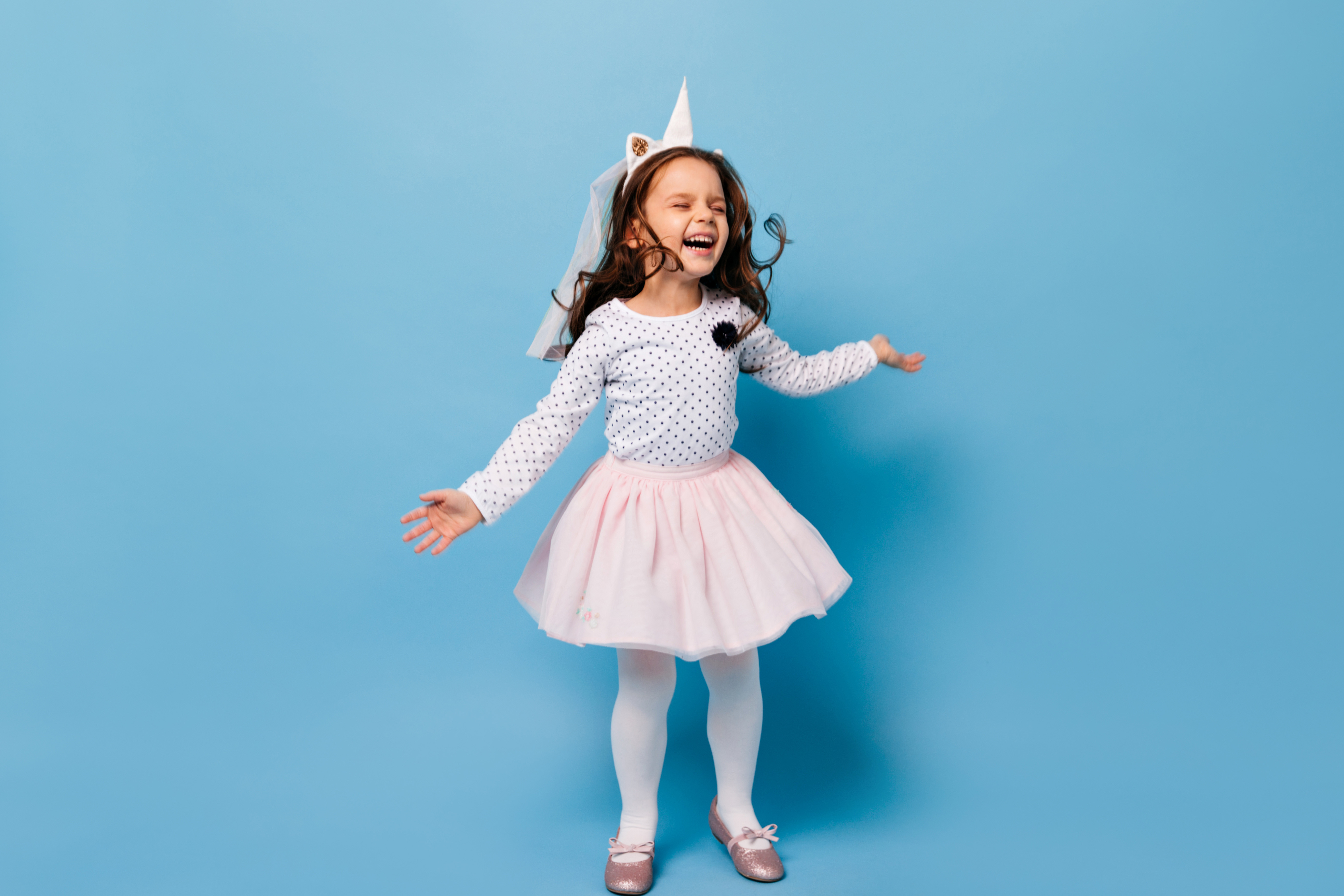 photo of girl dancer dressed as a unicorn